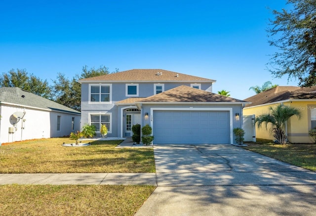 front of property with a garage and a front yard