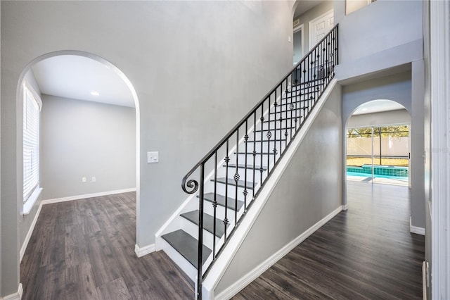 stairway with wood-type flooring