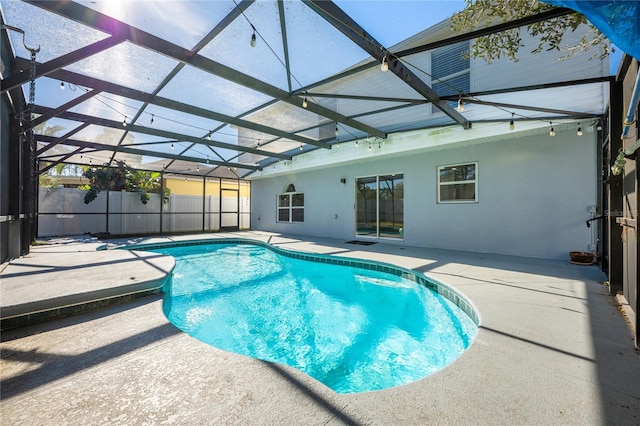 view of pool featuring a patio area and a lanai