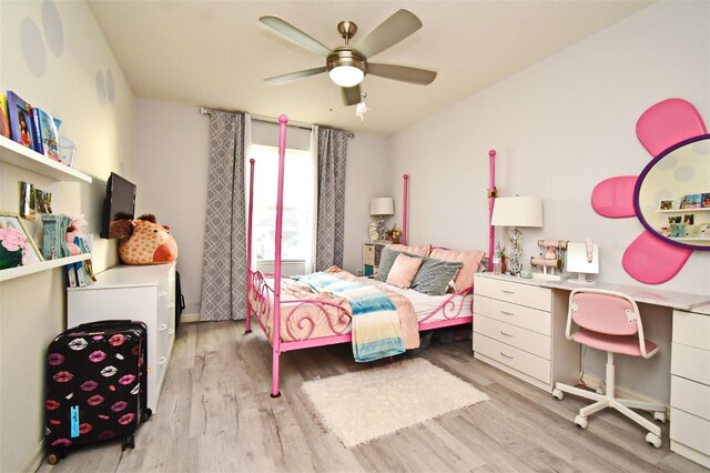 bedroom with ceiling fan and light hardwood / wood-style flooring