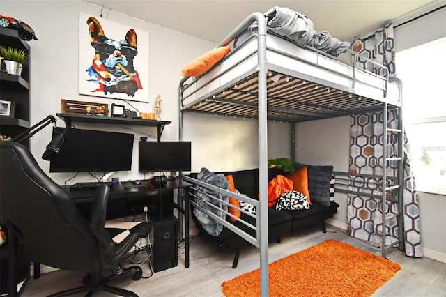 bedroom featuring light hardwood / wood-style floors