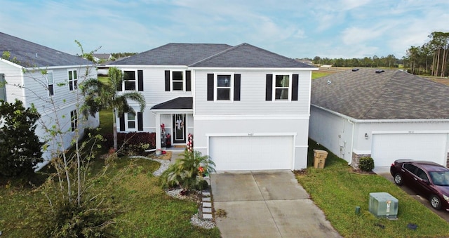 view of front of property with a garage