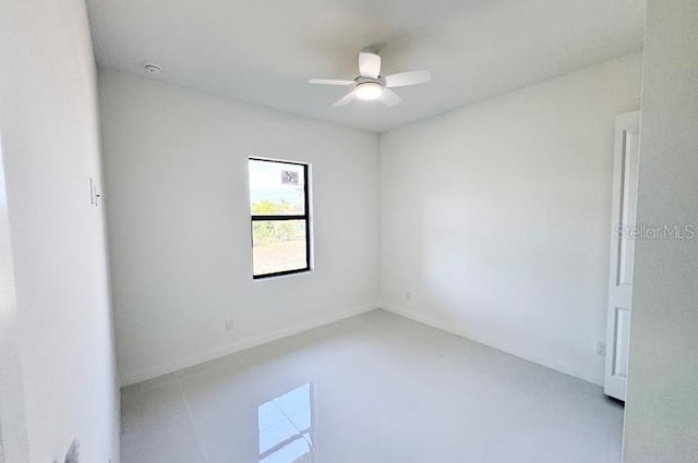 spare room featuring ceiling fan