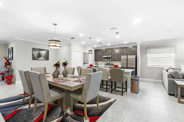 dining space with light tile patterned floors, recessed lighting, visible vents, baseboards, and ornamental molding