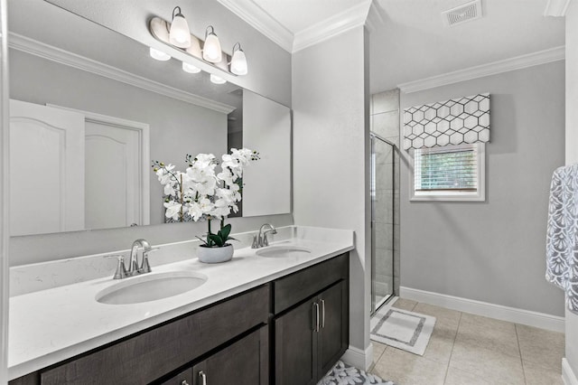 bathroom featuring vanity, tile patterned floors, a shower with shower door, and crown molding