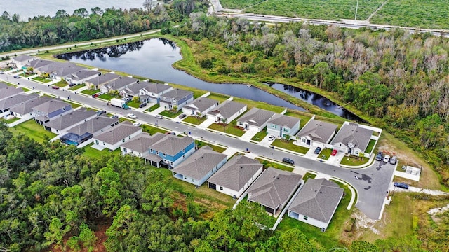 aerial view with a water view and a residential view