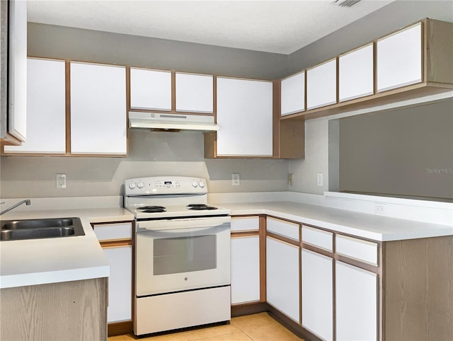 kitchen with sink, electric range, light tile patterned floors, a textured ceiling, and white cabinetry