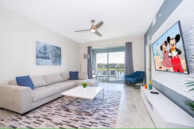 living room featuring ceiling fan and light tile patterned flooring