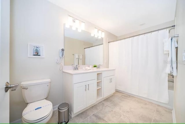 full bathroom with shower / tub combo, vanity, toilet, and tile patterned floors