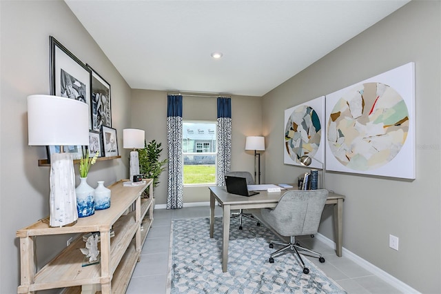 home office with tile patterned floors