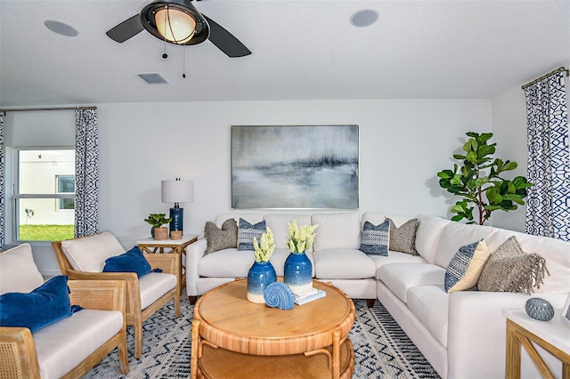 living room featuring ceiling fan