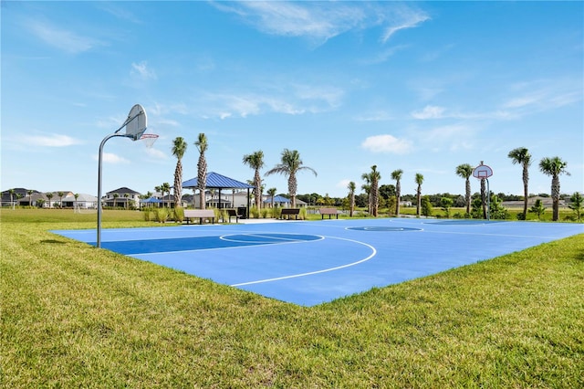 view of sport court with a gazebo and a lawn