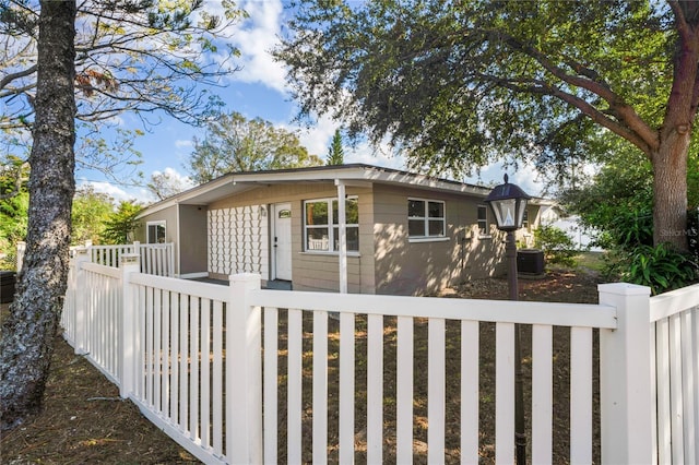 view of front of property with cooling unit