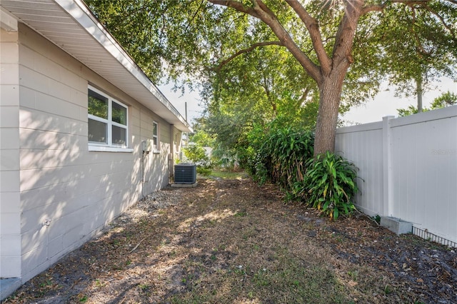 view of yard featuring central AC