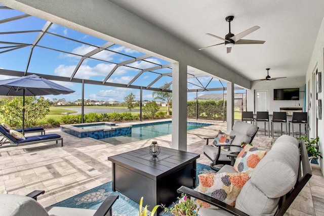 view of patio featuring exterior bar, an outdoor living space, a lanai, and a pool with hot tub