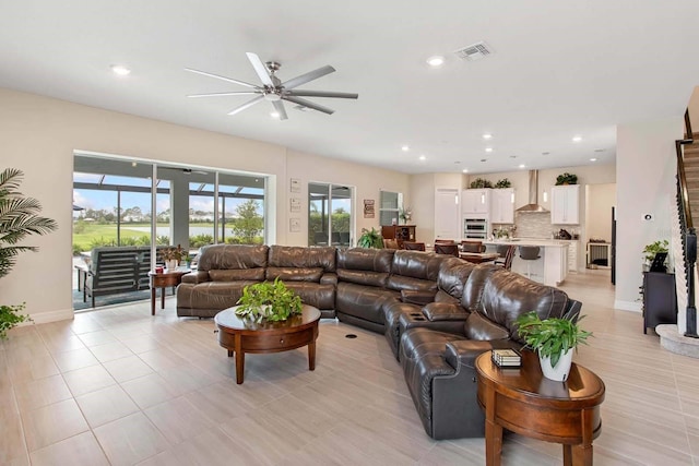 living room with ceiling fan