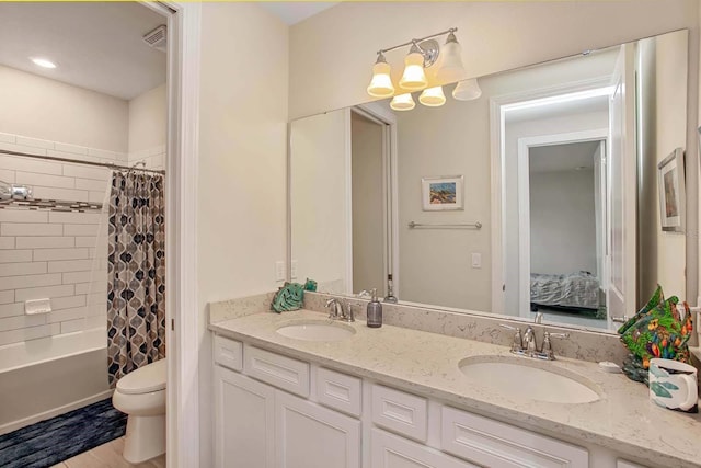 full bathroom with vanity, wood-type flooring, shower / tub combo, and toilet