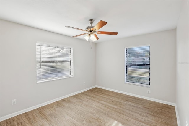 unfurnished room with ceiling fan and light hardwood / wood-style floors