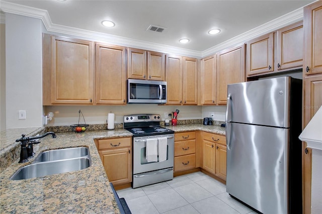 kitchen featuring light stone countertops, ornamental molding, sink, and appliances with stainless steel finishes