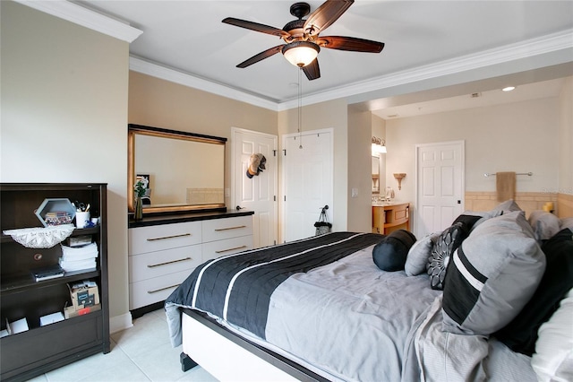 tiled bedroom featuring ceiling fan and ornamental molding