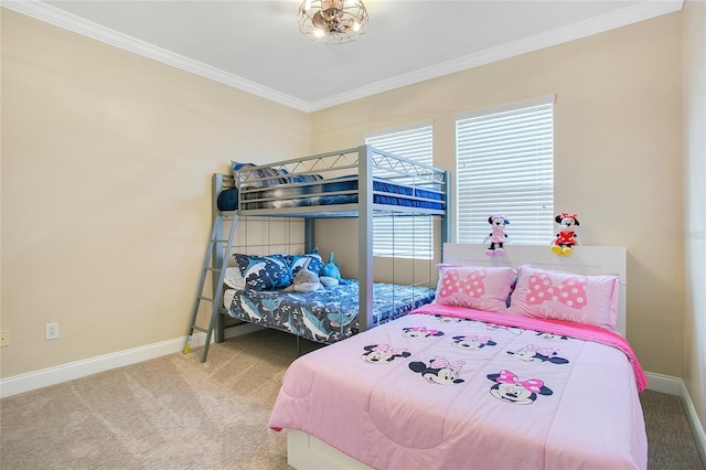 carpeted bedroom featuring crown molding