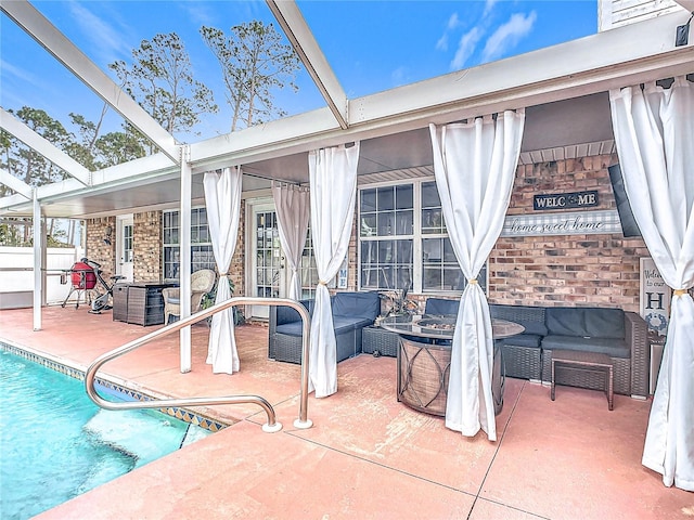 view of swimming pool with outdoor lounge area, a patio, and a lanai