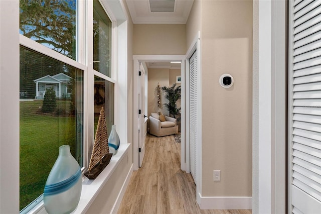 12133 Grand Oak Ln, Oxford, FL 34484 - hall with crown molding and light hardwood / wood-style flooring