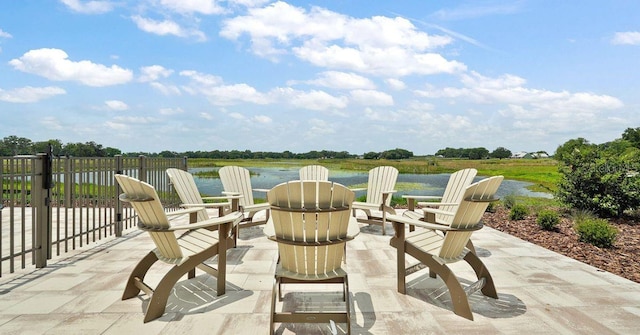 12133 Grand Oak Ln, Oxford, FL 34484 - view of patio / terrace featuring a water view