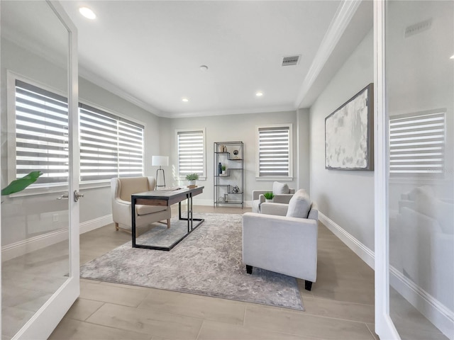 office area with ornamental molding, recessed lighting, a healthy amount of sunlight, and visible vents