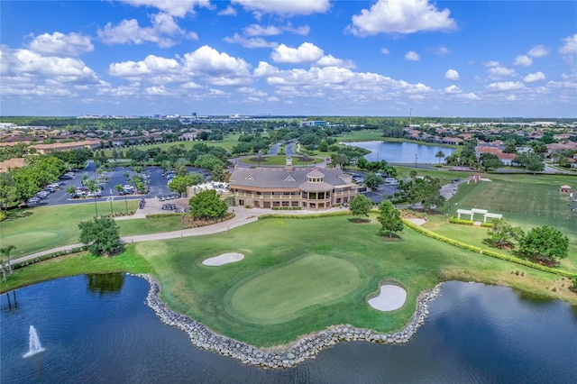 bird's eye view with a water view and golf course view