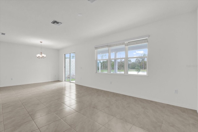 unfurnished room featuring light tile patterned floors, baseboards, visible vents, and a chandelier