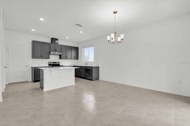 kitchen with under cabinet range hood, visible vents, light countertops, hanging light fixtures, and stainless steel electric stove