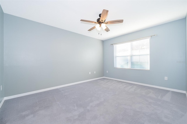 unfurnished room featuring carpet flooring and ceiling fan