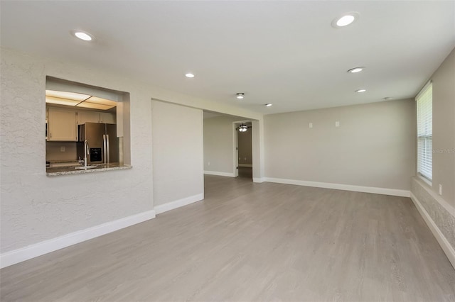 empty room featuring light hardwood / wood-style floors