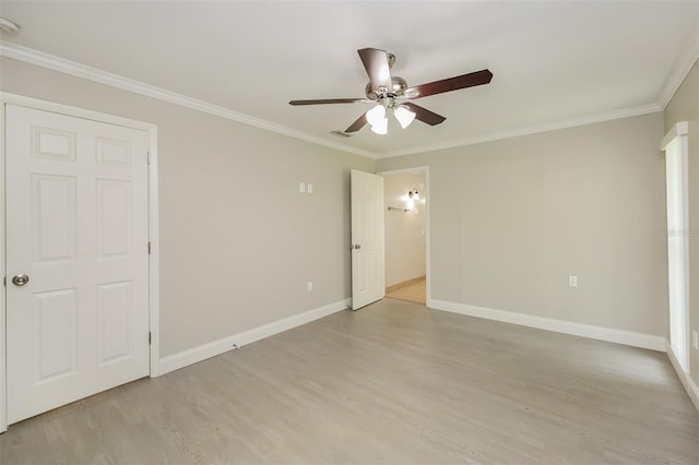 unfurnished bedroom with light hardwood / wood-style floors, ceiling fan, and ornamental molding