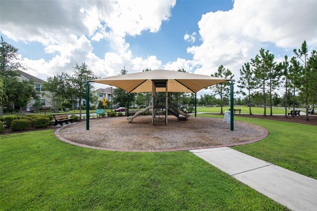 view of jungle gym with a yard