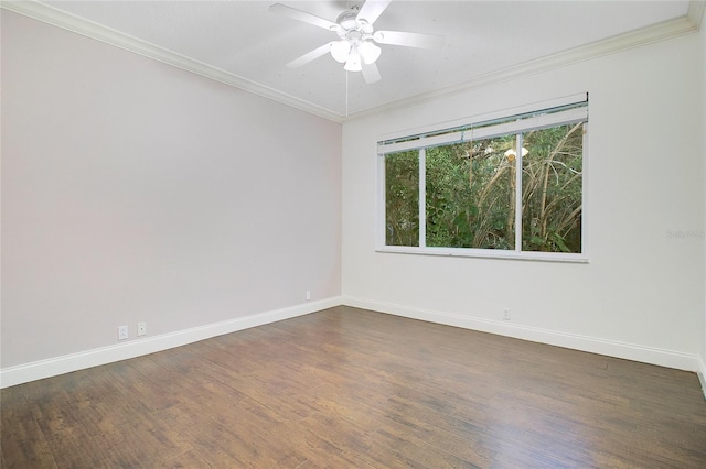 spare room featuring crown molding, ceiling fan, and dark wood-type flooring