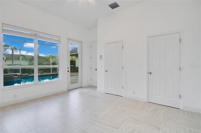 spare room featuring ceiling fan