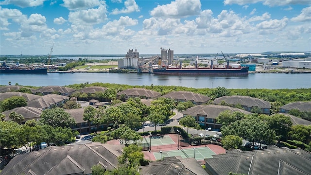 birds eye view of property with a water view