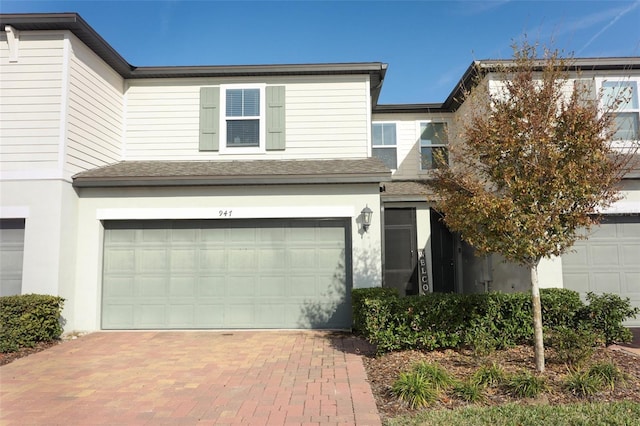 view of front of property featuring a garage