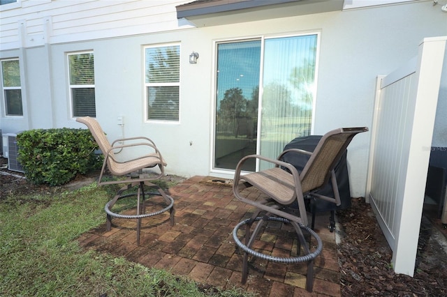 view of patio with central AC