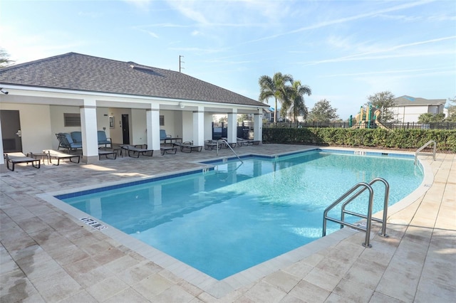 view of pool with outdoor lounge area and a patio