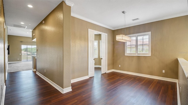 unfurnished dining area with dark hardwood / wood-style flooring and ornamental molding