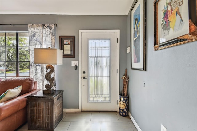 doorway featuring light tile patterned floors