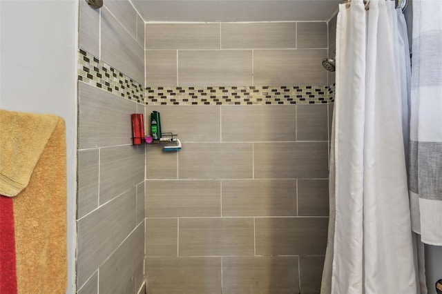 bathroom with a shower with curtain