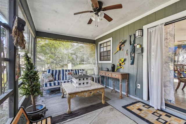 sunroom / solarium with ceiling fan