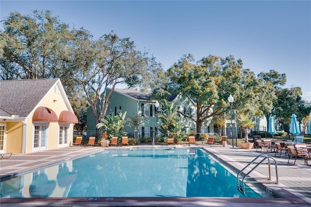 view of pool featuring a patio area