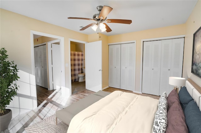 2053 Dixie Belle Dr Unit 2053C, Orlando, FL 32812 - bedroom featuring multiple closets, wood finished floors, ensuite bathroom, and a ceiling fan