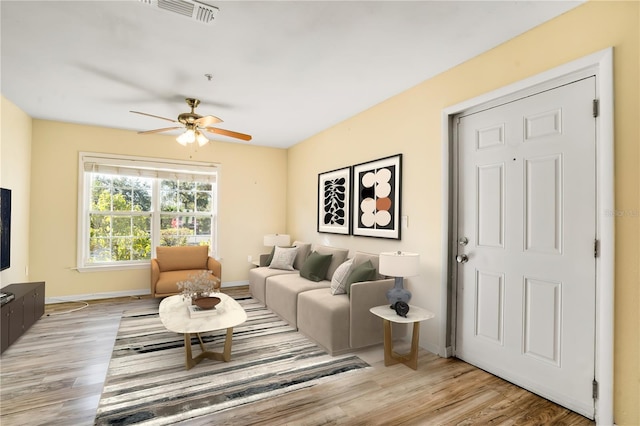 2053 Dixie Belle Dr Unit 2053C, Orlando, FL 32812 - living room with light wood-style floors and a ceiling fan