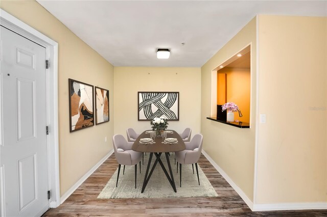 2053 Dixie Belle Dr Unit 2053C, Orlando, FL 32812 - dining area with wood finished floors